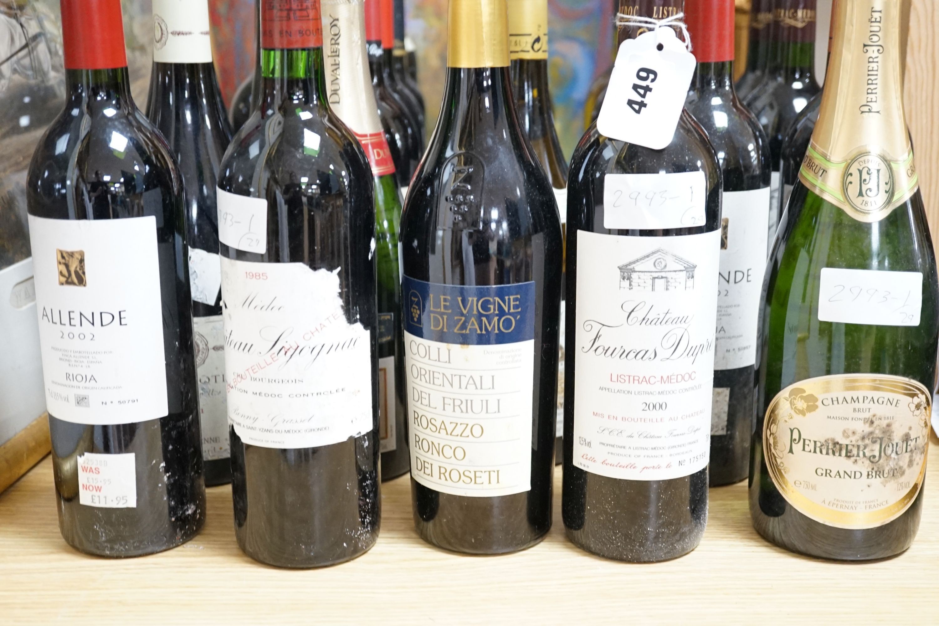 Twenty nine assorted bottles of wine is etc. including Les Tourelles de Longueville, 2003, Chateau Fourcas Dupre, 2000, Perrier Jouet Grand Brut Champagne, Chateau Sigognac, 1985 and Cote Rotie, 2001.